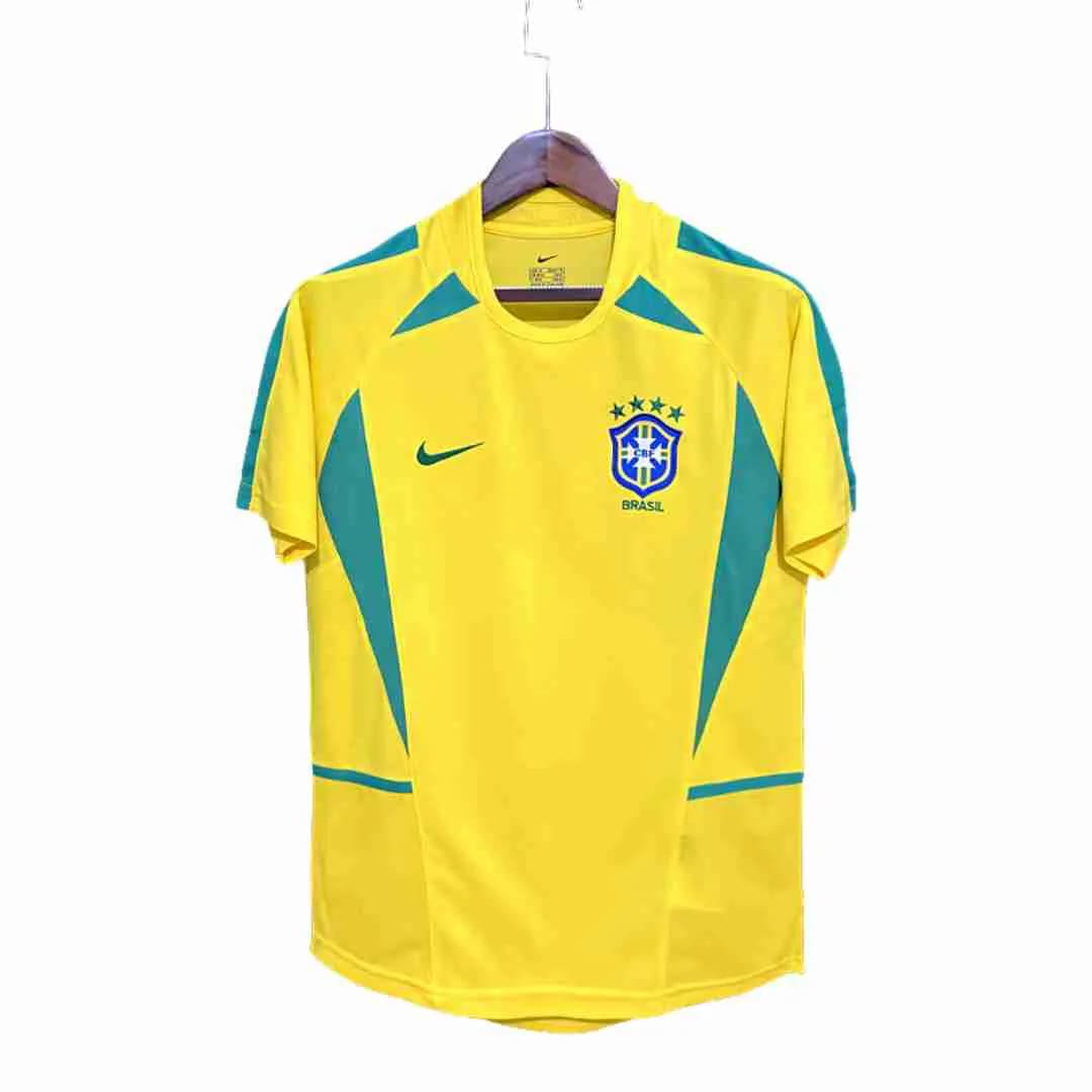 https://images.tcdn.com.br/img/img_prod/1044362/camisa_selecao_brasileira_retro_i_2002_nike_torcedor_masculina_1301_1_1a7b0dac6bfc00786891363bd76836d1.jpg